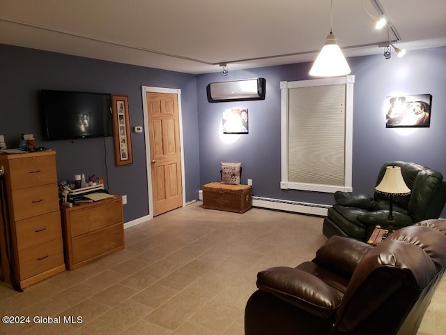 cinema room with an AC wall unit, light tile floors, a baseboard heating unit, and track lighting