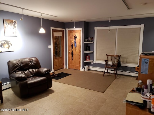 interior space with a baseboard radiator and light tile floors