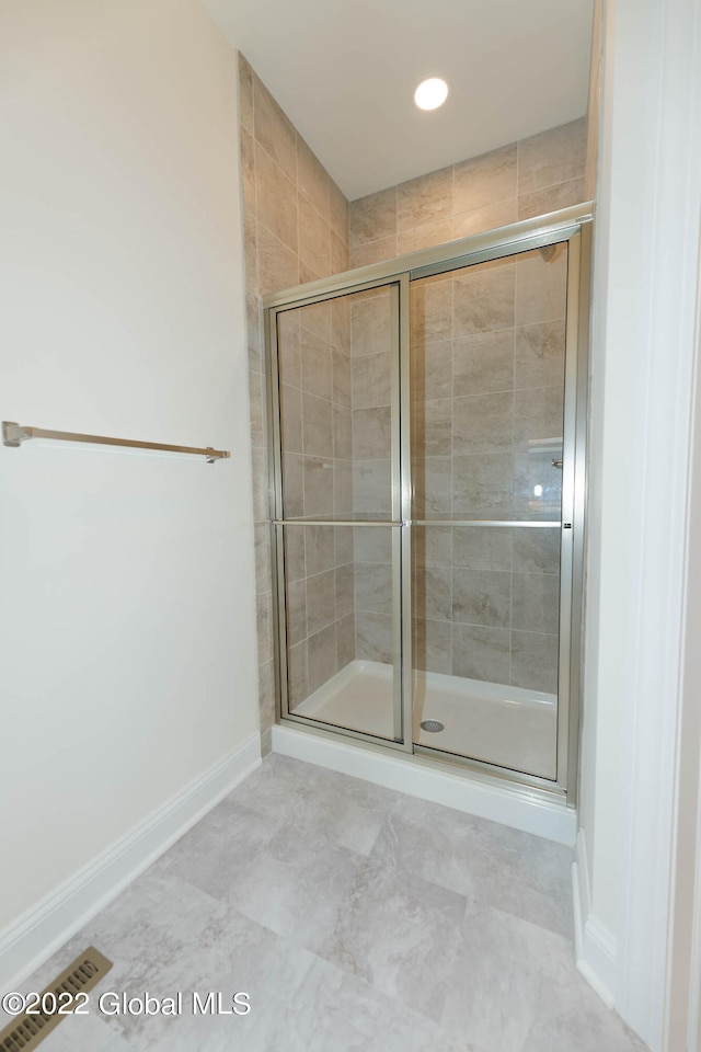 bathroom with walk in shower