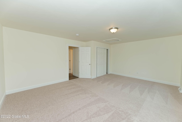 unfurnished bedroom featuring carpet flooring