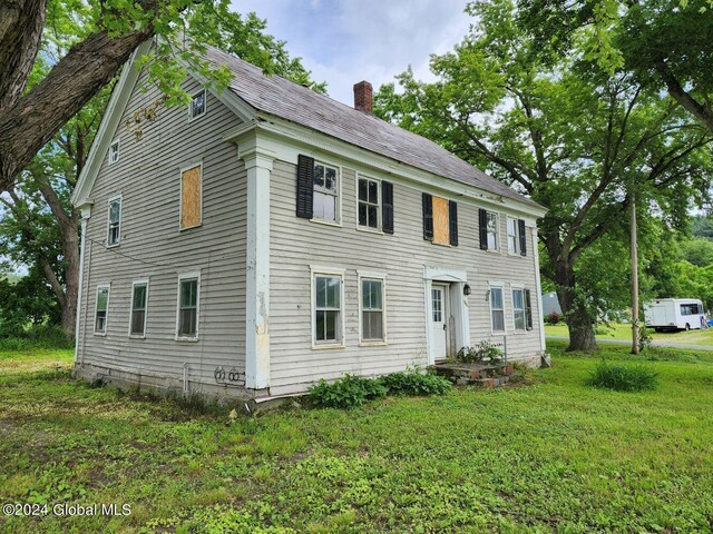 colonial house with a front lawn