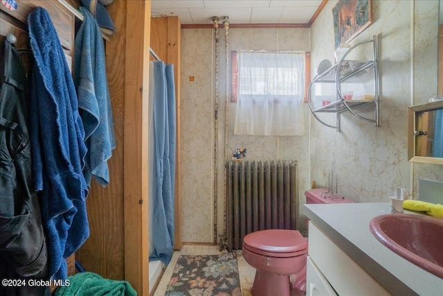 bathroom with vanity, curtained shower, tile flooring, toilet, and radiator heating unit