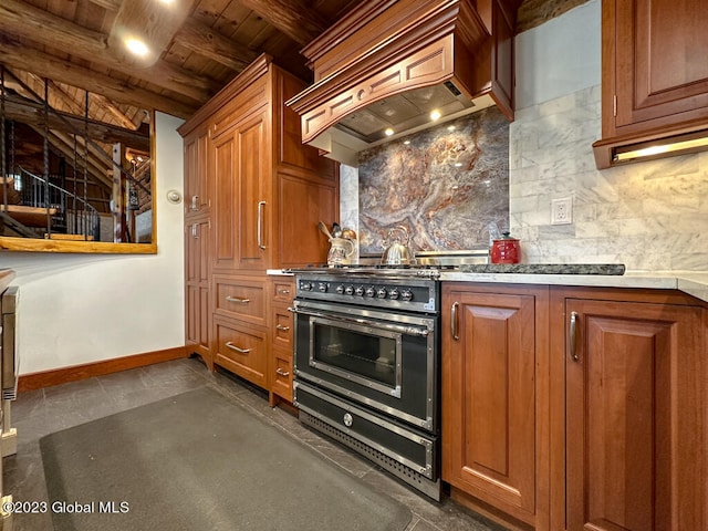 kitchen with beamed ceiling, premium range hood, dark tile floors, wood ceiling, and range with two ovens