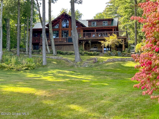 view of yard with a wooden deck