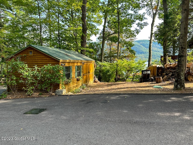 exterior space featuring a mountain view