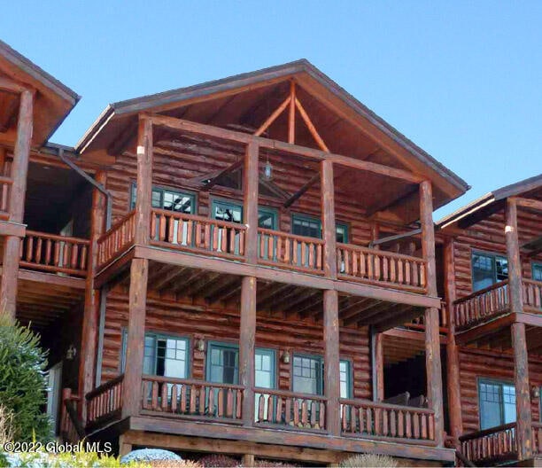 rear view of house with a balcony