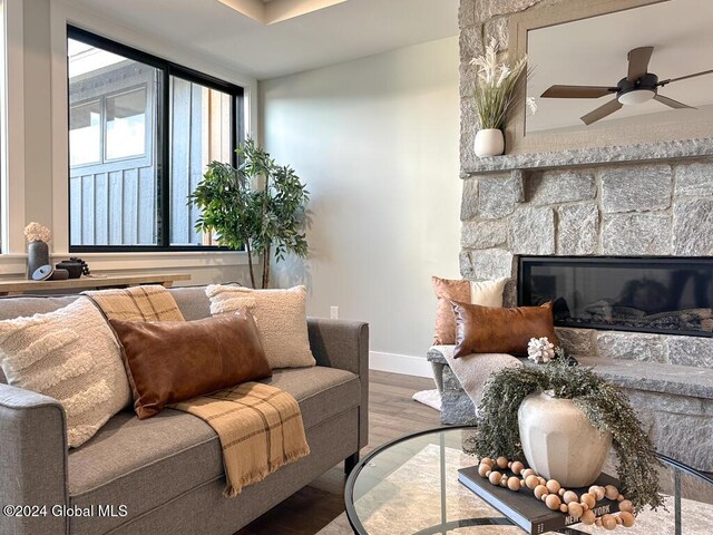 1 Kurosaka Ln Unit B, Lake George Village, NY 12845 - living room with hardwood / wood-style floors, ceiling fan, and a fireplace