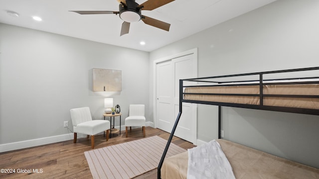 1 Kurosaka Ln Unit B, Lake George Village, NY 12845 - bedroom with ceiling fan, a closet, and hardwood / wood-style floors