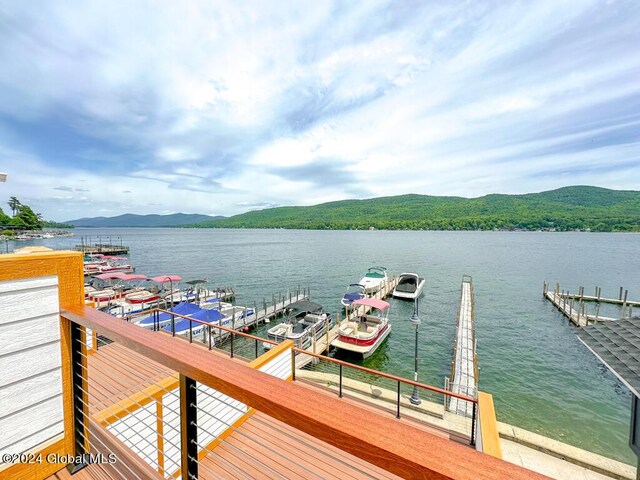 dock area with a water and mountain view