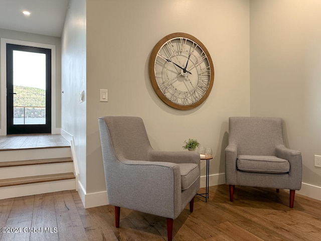 sitting room with hardwood / wood-style floors