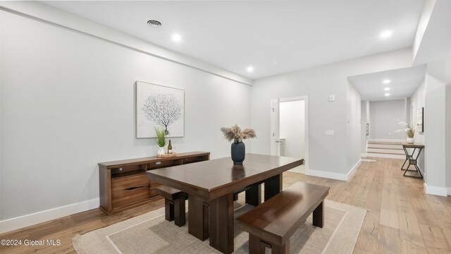 dining room with light wood-type flooring