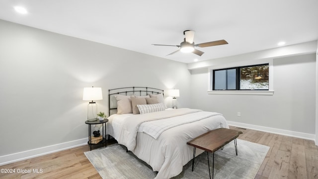 bedroom featuring ceiling fan and light wood-type flooring