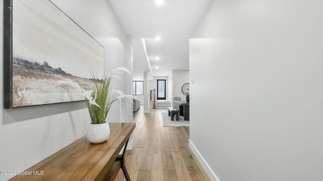 hallway featuring light hardwood / wood-style flooring