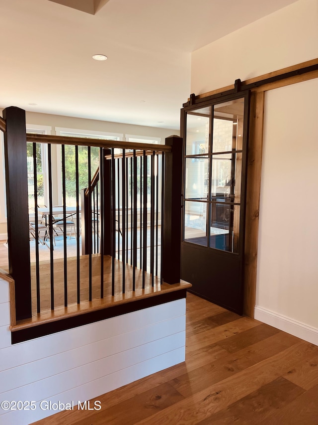 interior space with hardwood / wood-style floors