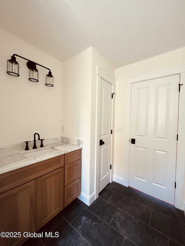 bathroom featuring vanity and tile patterned flooring