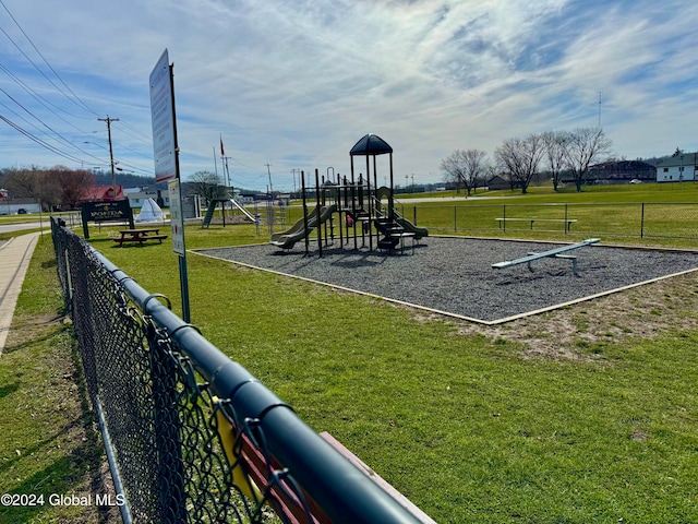 view of play area with a yard