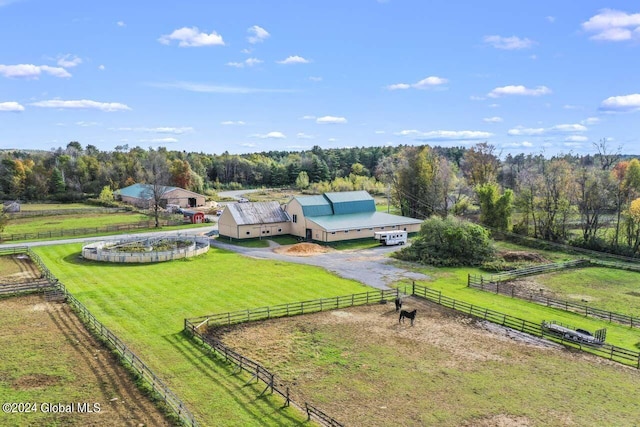 birds eye view of property featuring a rural view