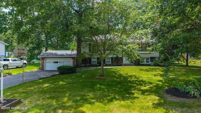 12 Lori Ln, Clifton Park, NY 12065 - view of front facade featuring a front yard and driveway