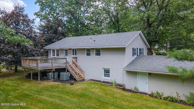 12 Lori Ln, Clifton Park, NY 12065 - back of property featuring a wooden deck, a yard, a shingled roof, stairs, and view of wooded area