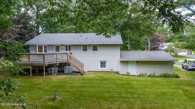 12 Lori Ln, Clifton Park, NY 12065 - back of house featuring a deck, a yard, a shingled roof, and stairway