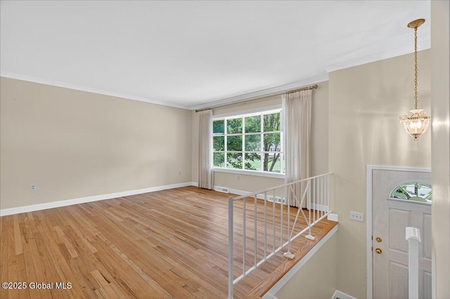 12 Lori Ln, Clifton Park, NY 12065 - foyer entrance with wood finished floors and ornamental molding
