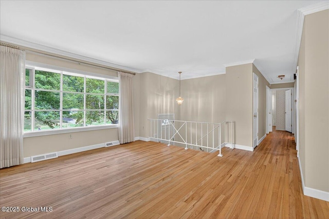 12 Lori Ln, Clifton Park, NY 12065 - empty room with crown molding and light wood-style floors