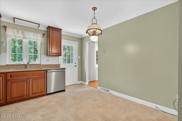 12 Lori Ln, Clifton Park, NY 12065 - kitchen with stainless steel dishwasher, crown molding, brown cabinets, pendant lighting, and backsplash