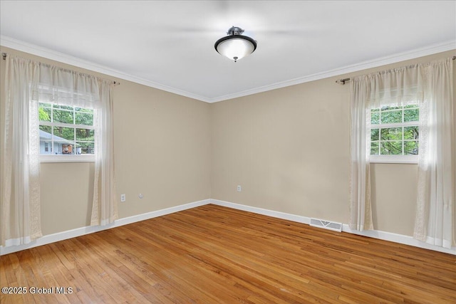 12 Lori Ln, Clifton Park, NY 12065 - unfurnished room with plenty of natural light, light wood-style floors, and ornamental molding