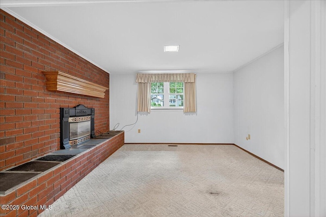 12 Lori Ln, Clifton Park, NY 12065 - unfurnished living room featuring a fireplace, carpet floors, and crown molding