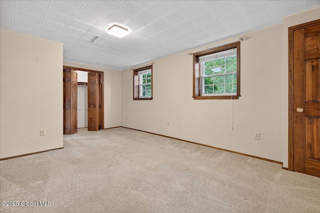 12 Lori Ln, Clifton Park, NY 12065 - carpeted empty room featuring baseboards