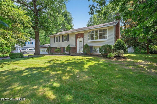 12 Lori Ln, Clifton Park, NY 12065 - raised ranch featuring a chimney, a front lawn, and brick siding