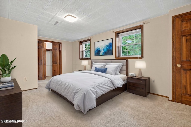 12 Lori Ln, Clifton Park, NY 12065 - bedroom featuring light colored carpet and a closet