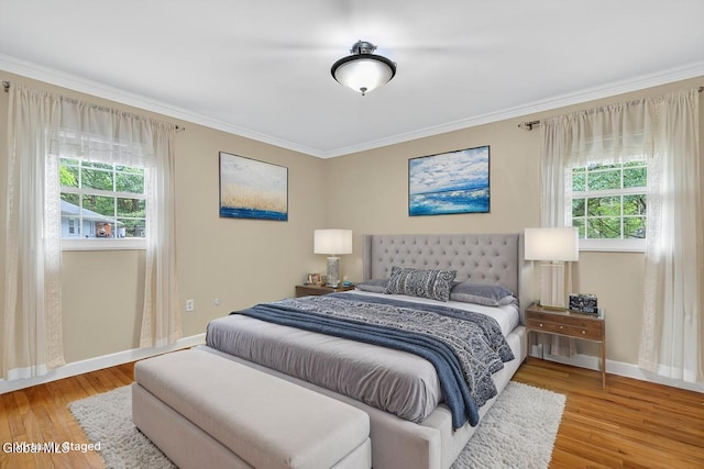 12 Lori Ln, Clifton Park, NY 12065 - bedroom with multiple windows, light wood-type flooring, and ornamental molding