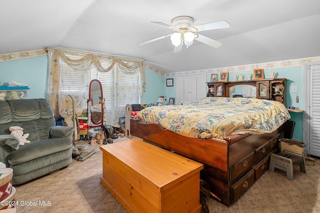 bedroom featuring light carpet, ceiling fan, and lofted ceiling