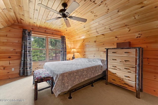 bedroom with ceiling fan, wooden ceiling, light carpet, lofted ceiling, and wooden walls