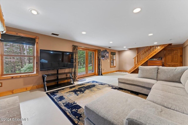 living room with light colored carpet