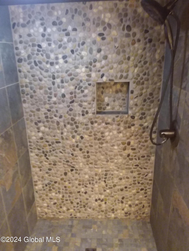 bathroom featuring walk in shower