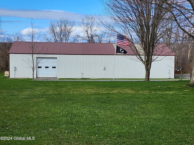 exterior space featuring an outdoor structure and a garage