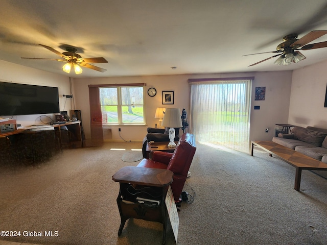 living room with carpet floors and ceiling fan