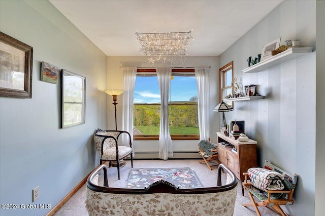 living area featuring a chandelier and carpet floors