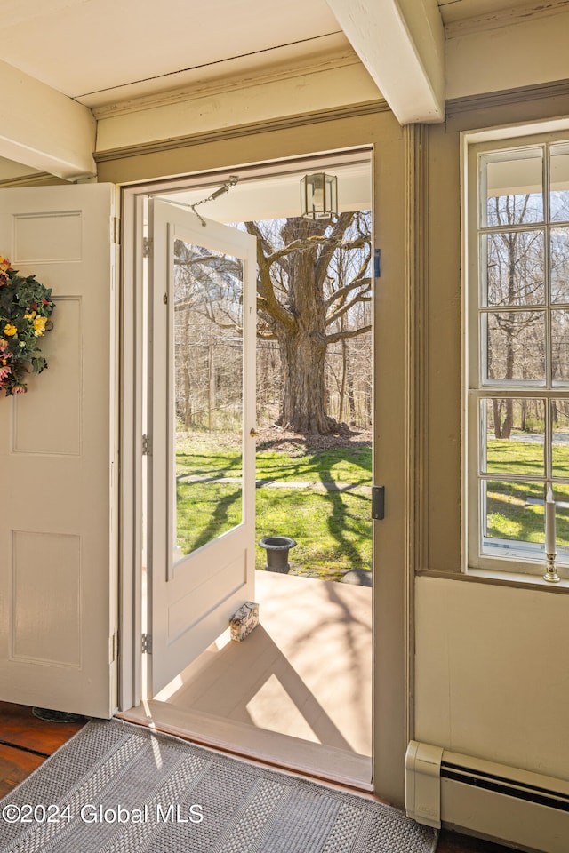 doorway with baseboard heating