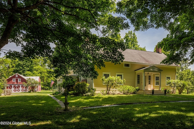 view of front of property with a front lawn