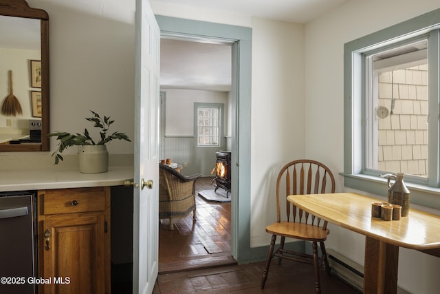 dining room featuring a wood stove