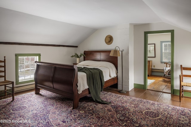 bedroom featuring lofted ceiling