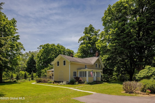 view of front of house with a front yard