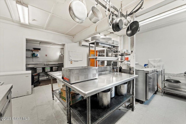 interior space with light tile floors and a wall mounted air conditioner