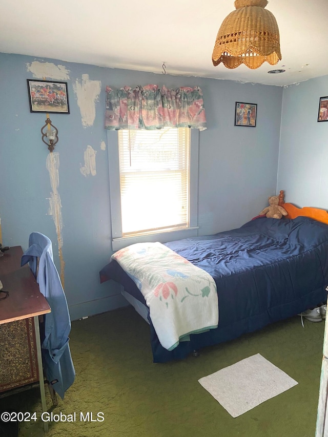 bedroom featuring carpet flooring