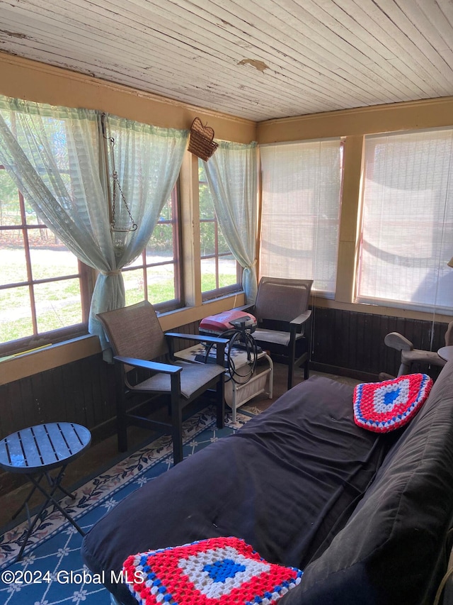 sunroom / solarium featuring wooden ceiling