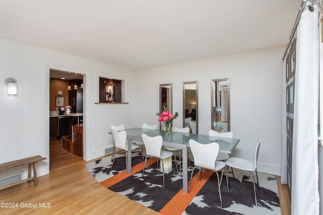 dining room featuring light wood-type flooring