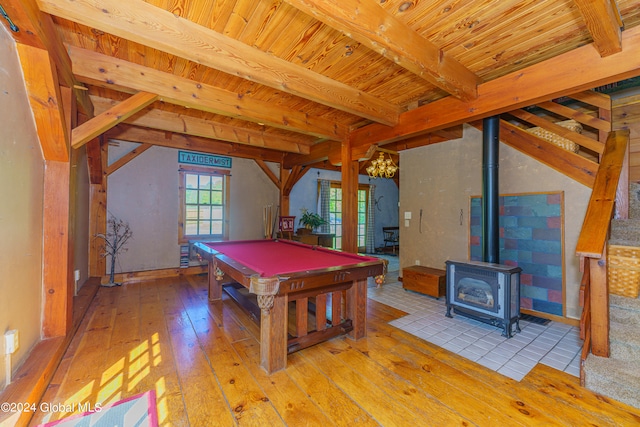 playroom featuring wooden ceiling, billiards, a wood stove, and hardwood / wood-style flooring